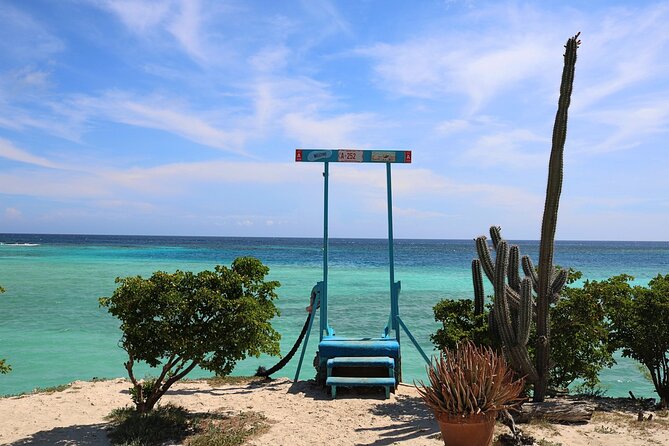 Art, Beach and Culture Island Tour with Kini Kini - Baby Beach: Quick Swim Time at Shallow, Blue Water