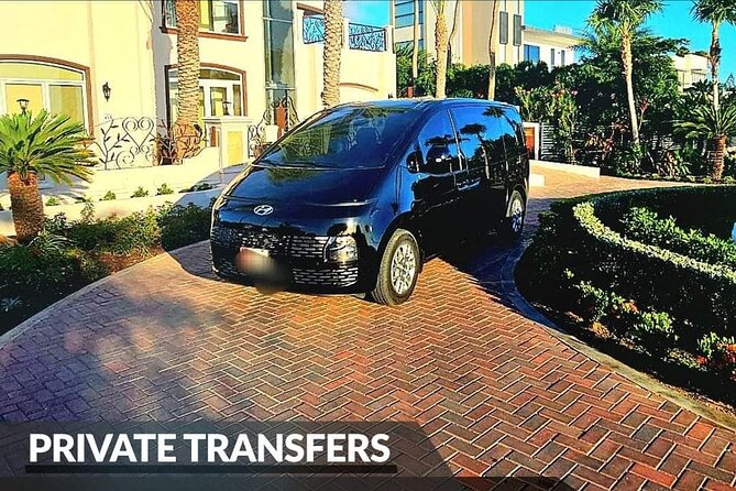 Aruba Airport Transfers (ROUND-TRIP) - Airport pickup: the name sign and dispatcher help