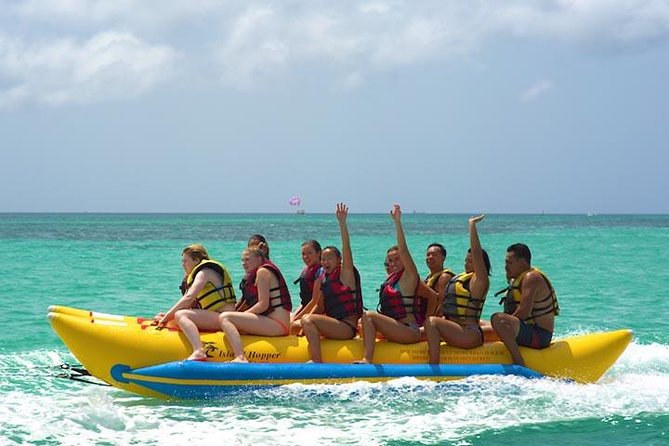 Aruba Banana Boat Fun Ride - The Speedboat Pull: Thrill Level, Slippery Risks, and Holding On