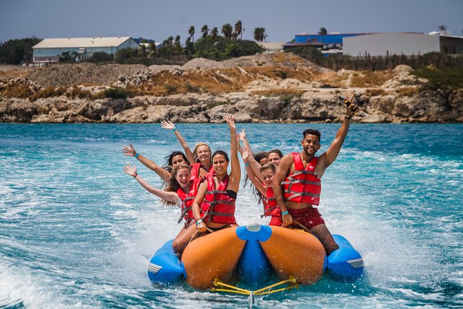 Aruba De Palm Island Day Pass - Palapas, cabanas, and a rocky shoreline: comfort is part of the plan