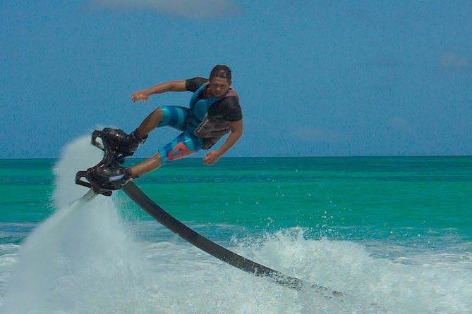 Aruba Flyboarding & Jetovator Experience: Fly Like a Bird & Dive Like a Dolphin - What you do on the flyboard: flying like a bird, then going under like a dolphin