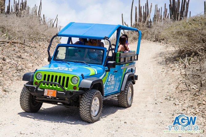 Aruba Jeep Tour: Natural Pool, Caves and Baby Beach Adventure - Conchi Natural Pool: Steps, Tidal Lagoon, and Snorkel Reality