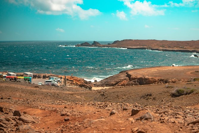 Aruba Jeep Tour: Natural Pool, Caves and Baby Beach Adventure - Baby Beach (Klein Lagoen): Shallow Water, Quick Break