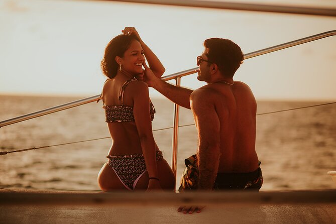Aruba Morning Snorkeling or Sunset Sail to Boca Catalina With BBQ - The sunset sail feel: dinner with the sky shift