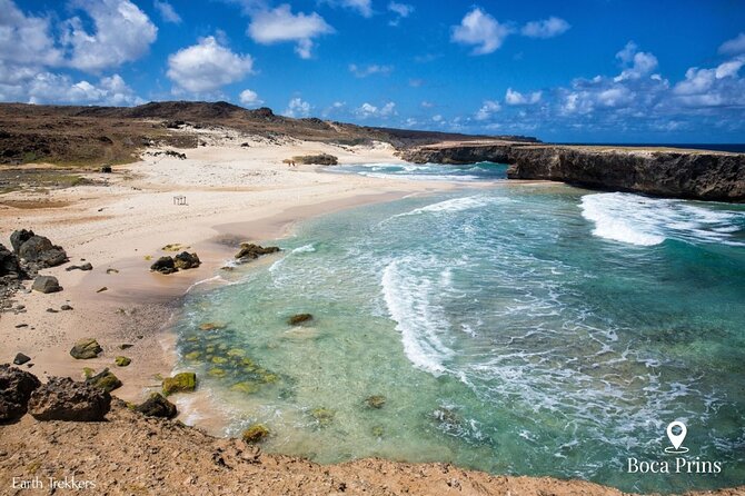 Aruba Natural Wonders Caves and Natural Pool Jeep Tour - Ayo Rock Formations: boulders, viewpoints, and Arawak carvings