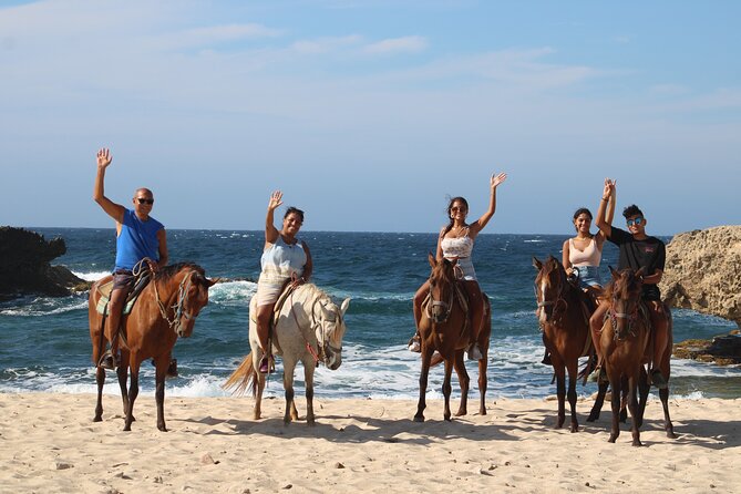 Aruba North Coastline: Small-Group Horseback Riding Tour - Wariruri Bay: dunes, beach riding, and the baby natural bridge