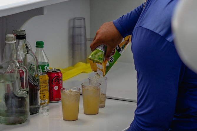 Aruba Sunset Sail - The Arusun Catamaran - Snacks and drinks: chicken and tuna wraps plus a full soft-drink lineup