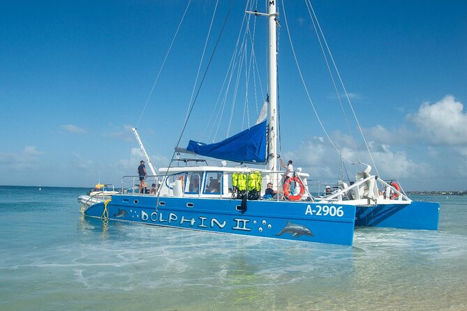 Dolphin Catamaran Snorkel and Sail with Open Bar - The Antilla and reef timing: lunch in between and why that matters