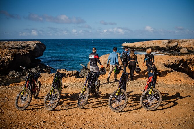 Epic Off-Road Surron Electric Bike Tour in Aruba - Entering the ride: Santa Cruz check-in, helmets, and bike practice