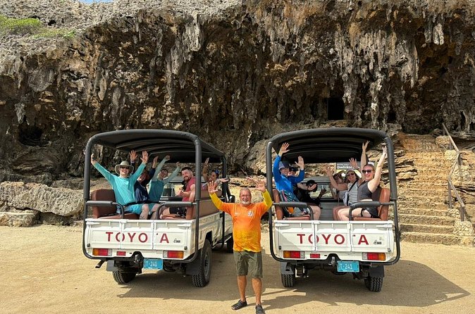 Jeep Tour Arikok National Park and Snorkeling at Baby Beach - Fontein Cave and Quadirikiri Cave: art, sunbeams, and a fish pedicure