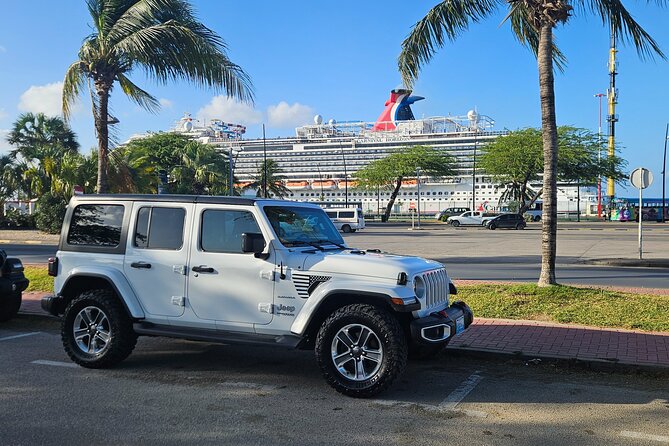 Jeep Wrangler 4 Door HardTop Rental in Aruba - Natural Pool, Arikok National Park, and a Natural Bridge Stop