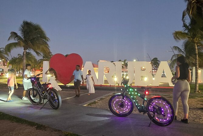 Semi-Private Christmas Edition Twilight Glow E-Bike Oranjestad - Plaza Turismo: The ARUBA Sign Stop That Actually Makes Sense