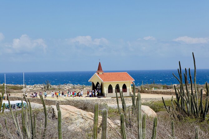 ThrillSeekers: Aruba UTV Tour & Cliff Jump at Natural Pool - North-coast landmarks: Wariruri Bridge, Bushiribana ruins, and Alto Vista Chapel